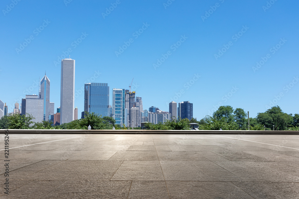 empty ground with modern cityscape in chicago empty ground with modern cityscape in chicago