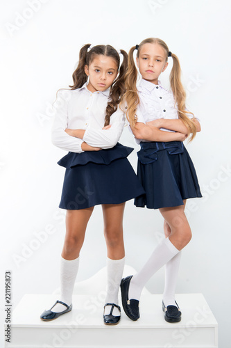 Foto Schoolgirls haughty arrogant with ponytails hairstyle