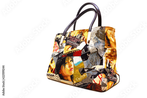 Fashionable handbag at an angle for girls on a white isolated background