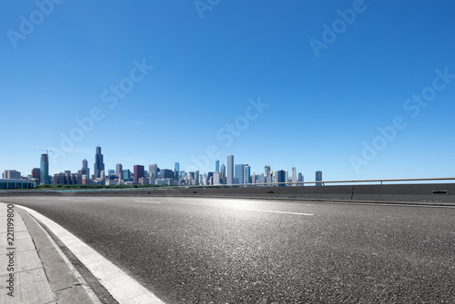 asphalt highway with modern city in chicago