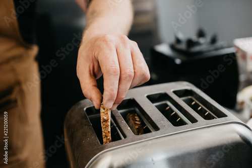Man toasting on toaster