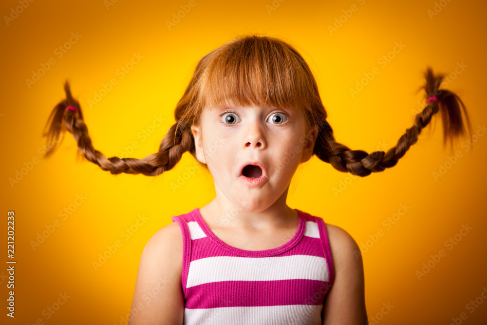 Surprised Little Girl with Pigtails, Gasping Stock Photo | Adobe Stock