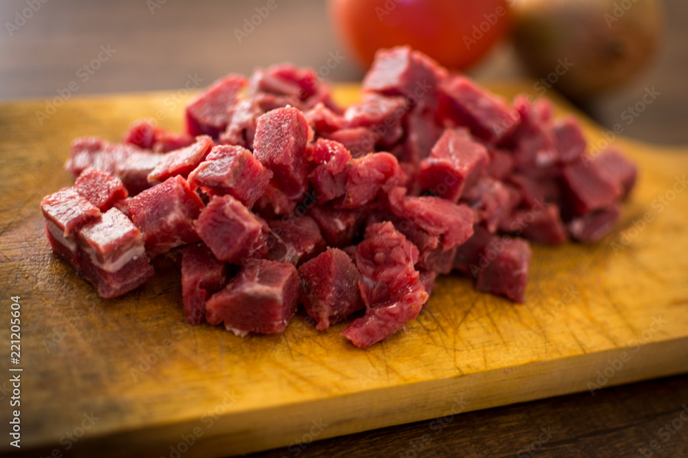 raw red meat chopped for strogonoff