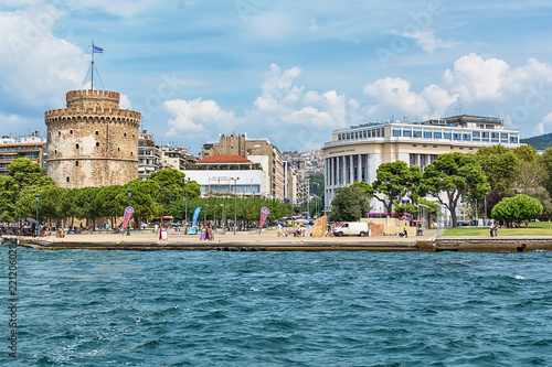 Thessaloniki, Greece - August 16, 2018: The National Theatre of Northern Greece & Aristotle's Theatre Building and White Tower in Thessaloniki. photo