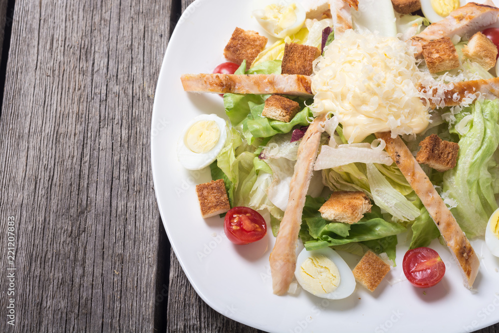 Salad ceasar with chicken , eggs and tomatoes Salad ceasar with chicken , eggs and tomatoes