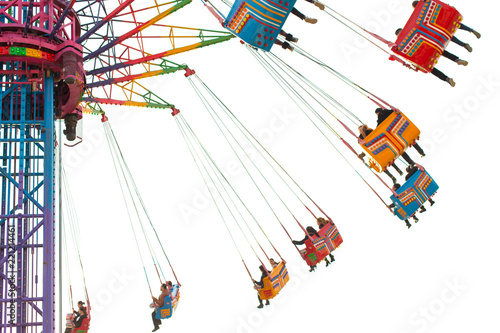 People who enjoy the attraction. High in the sky, a fun family day in an amusement park. Isolated on white background
