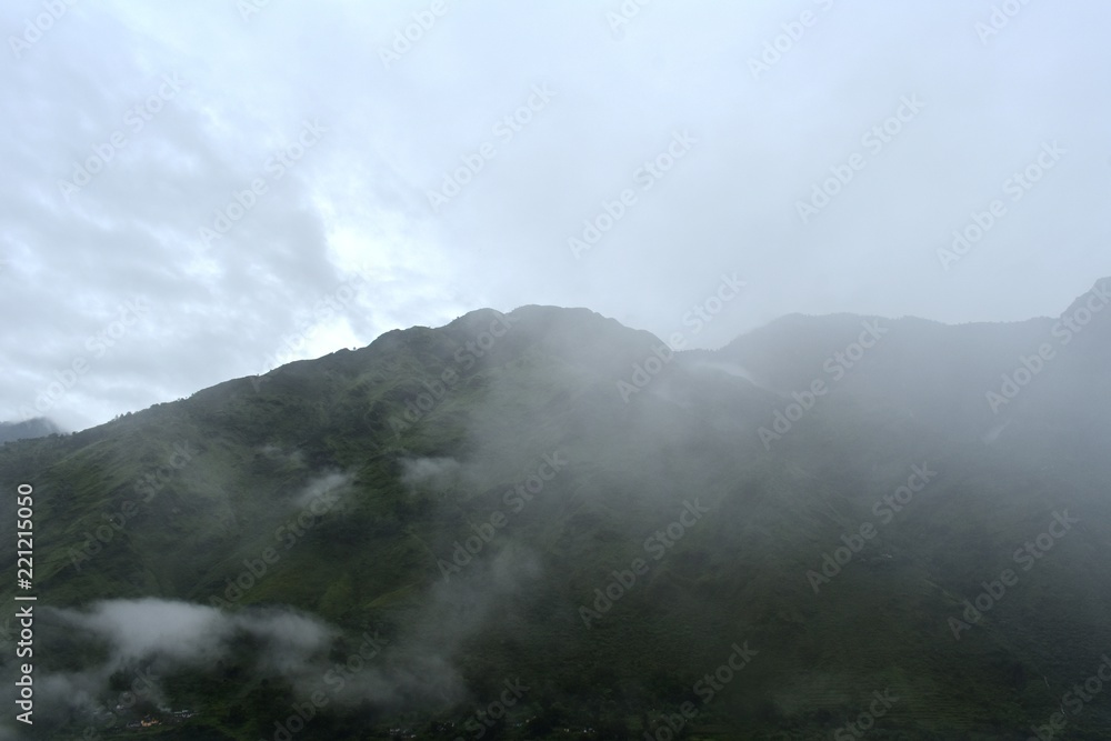 lush green mountains with clouds lush green mountains with clouds