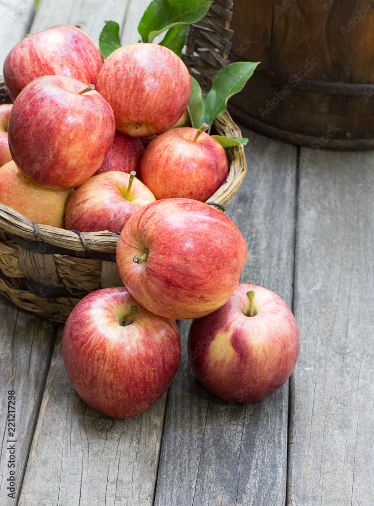 Fresh Red Apples on a Rustic Wooden Surface Fresh Red Apples on a Rustic Wooden Surface