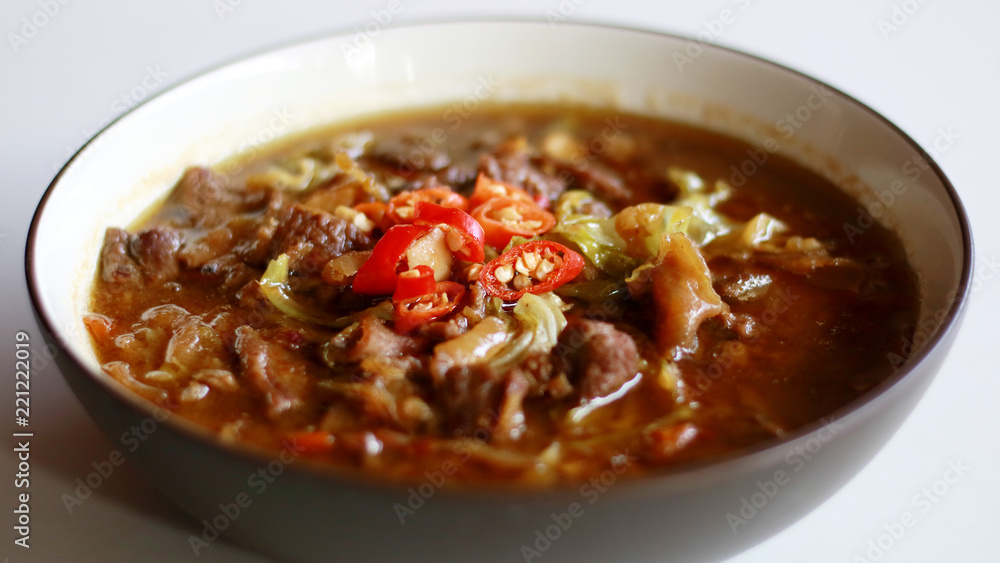 Tongseng. Goat meat stew cooked with sweet soy sauce, coconut milk, shredded cabbage and tomatoes. Commonly found in Indonesian region of Central Java, from Surakarta to Yogyakarta. Tongseng. Goat meat stew cooked with sweet soy sauce, coconut milk, shredded cabbage and tomatoes. Commonly found in Indonesian region of Central Java, from Surakarta to Yogyakarta.