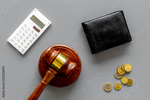 Financial failure, bankruptcy concept. personal bankruptcy. Judge gavel, wallet, coins, calculator on grey background top view
