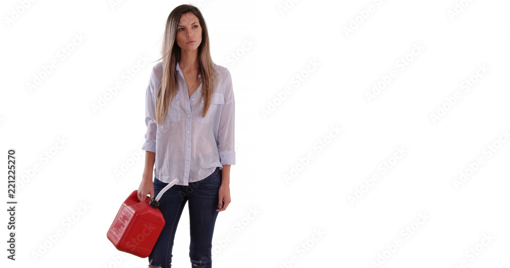 Stranded female motorist with red gas can looking for help on white background Stranded female motorist with red gas can looking for help on white background