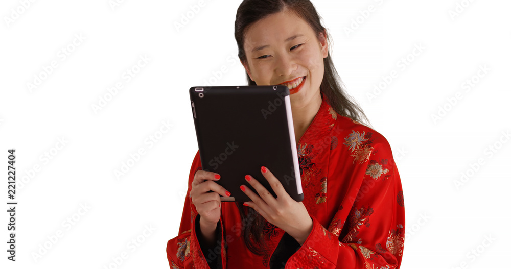 Close up of millennial woman video chatting with tablet for copyspace Close up of millennial woman video chatting with tablet for copyspace