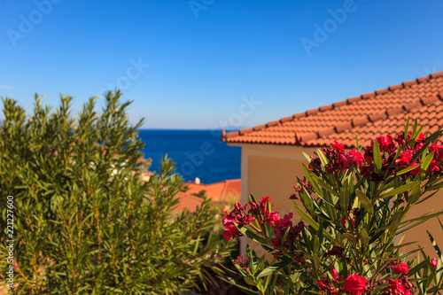 Houses roof on greek seaside © anetlanda