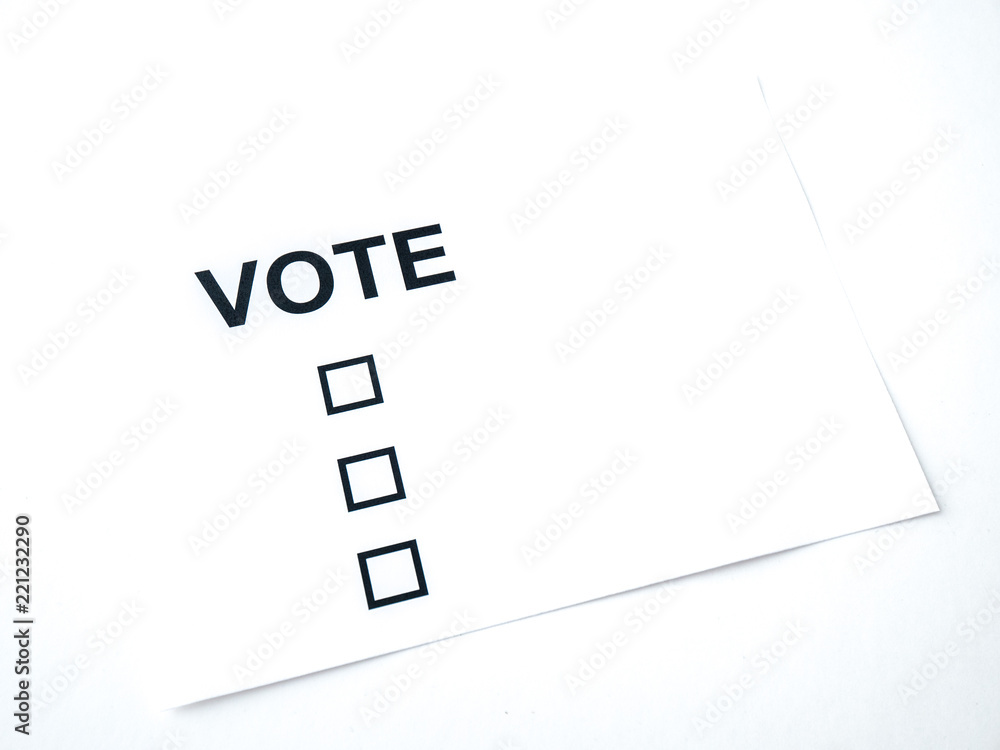 A closeup photograph of a blank generic vote ballot on white paper and white background. A closeup photograph of a blank generic vote ballot on white paper and white background.
