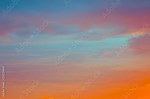 blue and orange sky clouds at sunset or sunrise. © Designer