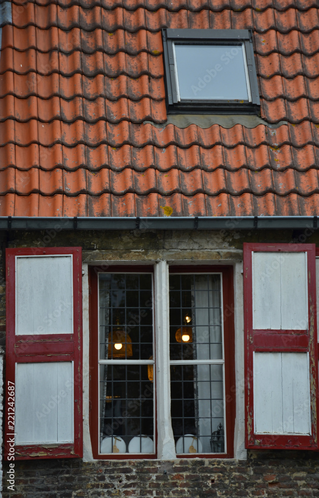 Old windows of houses in Brugge, Belgium