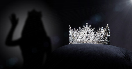 Diamond Silver Crown for Miss Pageant Beauty queen Contest, Crystal Tiara jewelry decorated gems stone and abstract dark background on black velvet fabric cloth, Macro photography copy space