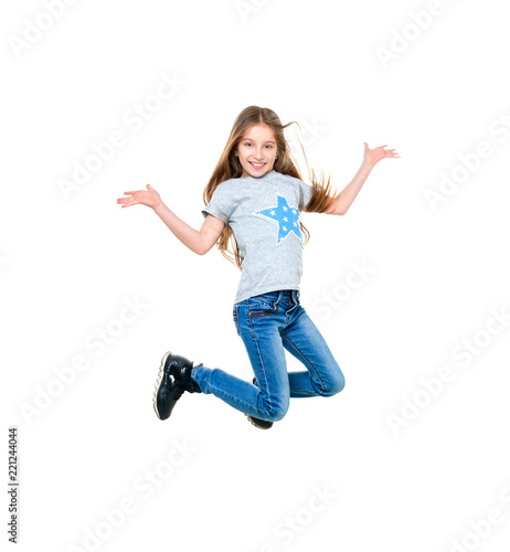 preteen girl dancing and jumping, isolated