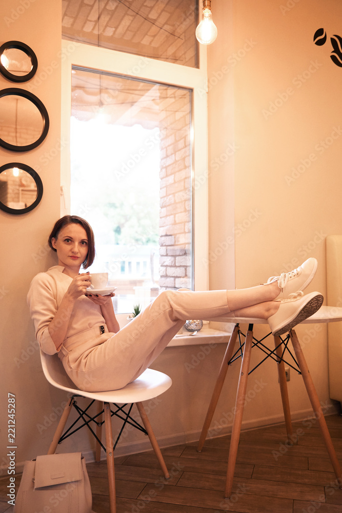 portrait of a young woman in a cafe portrait of a young woman in a cafe