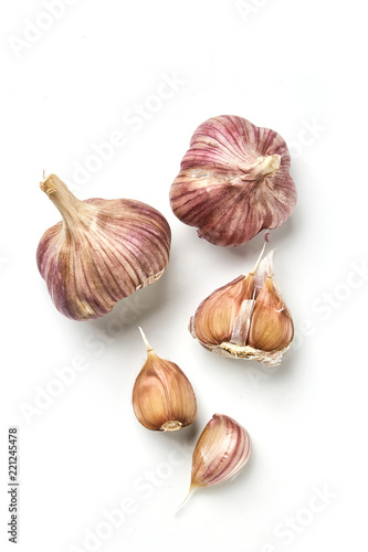 Garlic, garlic cloves on a white background, broken garlic isolated