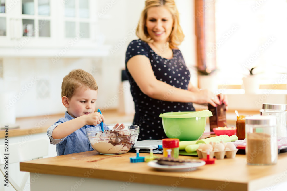 Happy mother and child in kitchen Happy mother and child in kitchen