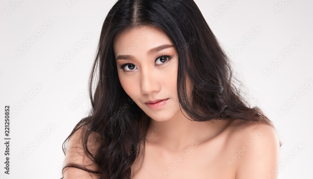Fototapeta premium Beautiful Young Asian Woman with Clean Fresh Skin