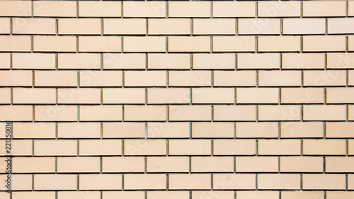 Yellow bricks in the wall as an abstract background