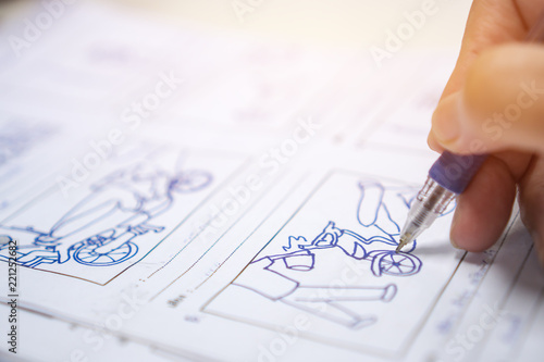 Artis drawing creative Storyboard or storytelling for film process on pre-production media films story script for video editors
