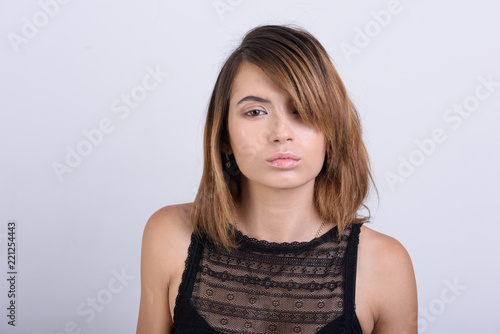 girl in black top on a white background