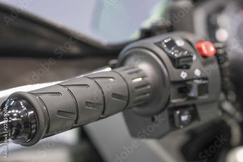 handlebar of a motorcycle close up