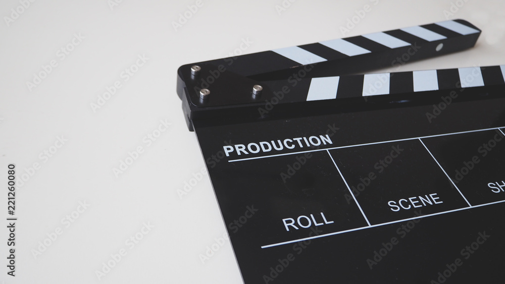 Clapper board or movie slate use in video production or movie and cinema industry. It's black color on white background.