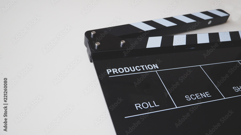 Obraz premium Clapper board or movie slate use in video production or movie and cinema industry. It's black color on white background.