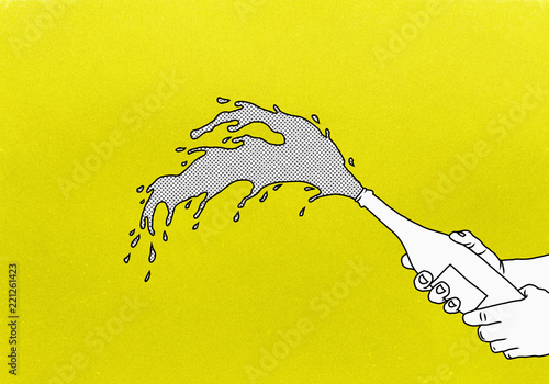 Exploding champagne on yellow background photo