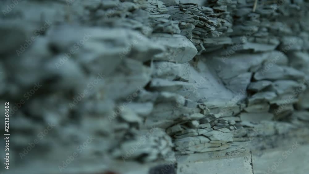 Close-Up Of A Stone Cliff Texture. Stone Landform Cliff Levels Close-Up Of A Stone Cliff Texture. Stone Landform Cliff Levels
