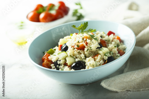 Couscous salad with tomatoes and olives