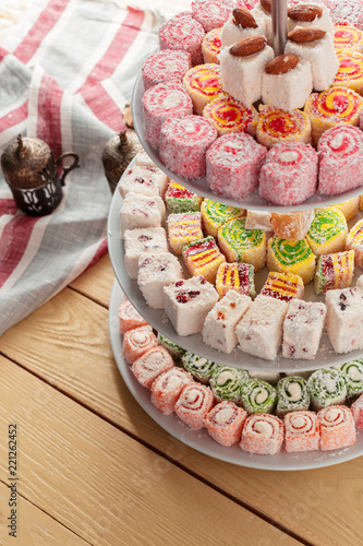 Canvas Print Turkish delight on a wooden table.