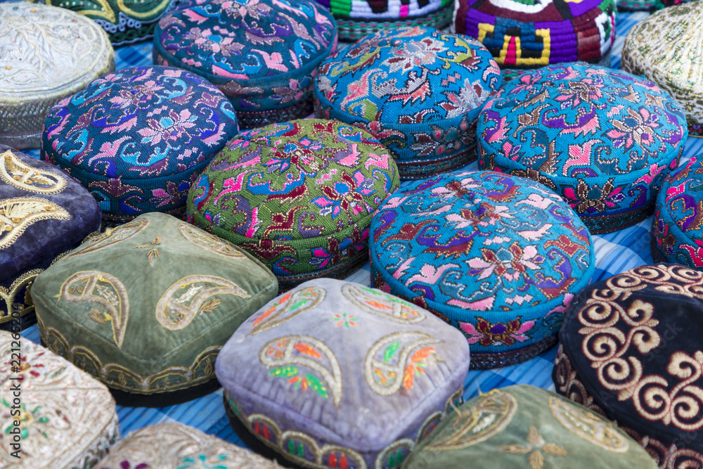 The traditional Uzbek cap named tubeteika, decorated with multi colored embroidery. Bukhara, Uzbekistan, Central Asia
