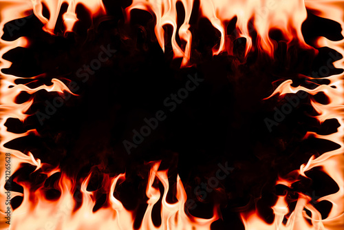 Frame with burning orange flame with blank space in middle on black backdrop