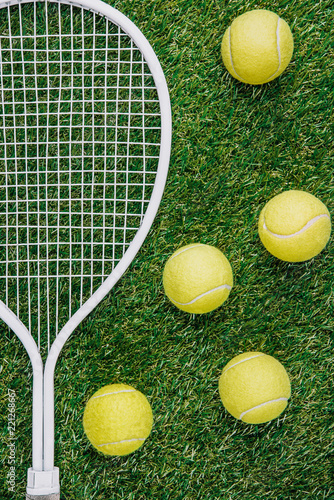 top view of tennis equipment of green grass © LIGHTFIELD STUDIOS