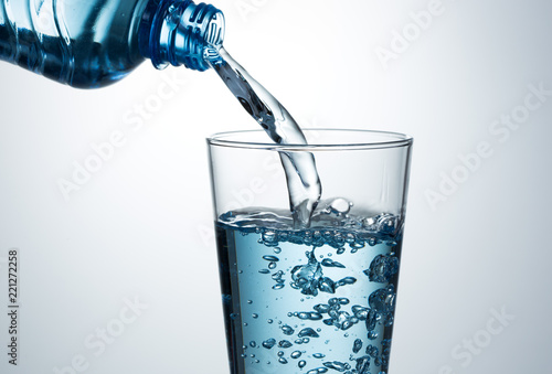 Wallpaper Mural Pouring water from bottle into glass Torontodigital.ca