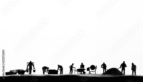 Silhouette  worker, construction crews to work on site,home building  site © pinate