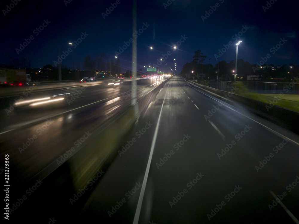 Busy motorway at night in Auckland Busy motorway at night in Auckland