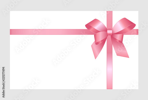 Decorative pink bow with horizontal pink ribbons isolated on white. 