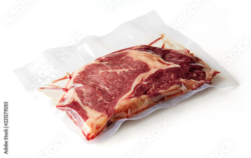 Beef steak vacuum sealed isolated on white