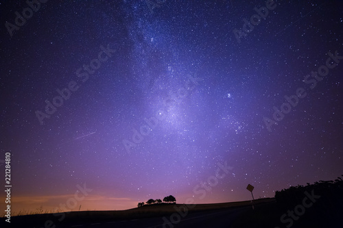 Shooting Stars Crossing in Milky Way and Starry Sky before Dawn.