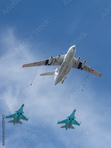 The IL-78 simulates refueling two Su-34.
