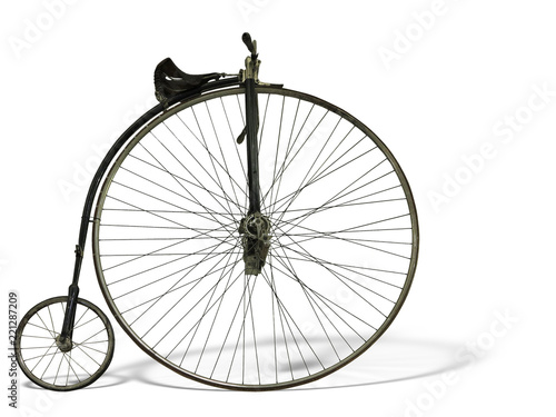 Vintage old retro bicycle isolated on white background photo