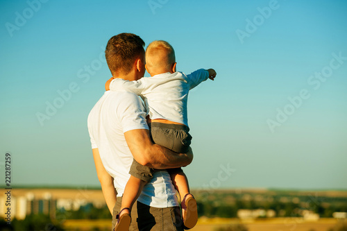 Fototapeta Naklejka Na Ścianę i Meble -  Dad and son outdoor