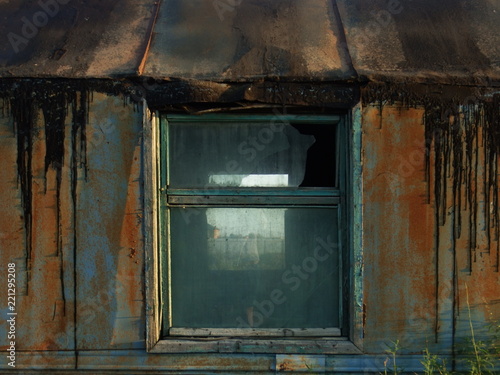 a window in an abandoned van