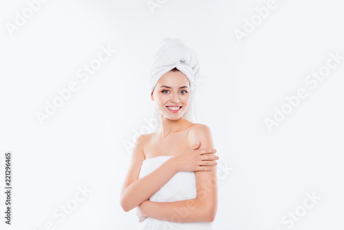 Portrait with copy space of pretty brunette girl with towel on h